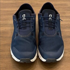 On cloudRunning Men's Dark Blue Sneakers with flip down rear.